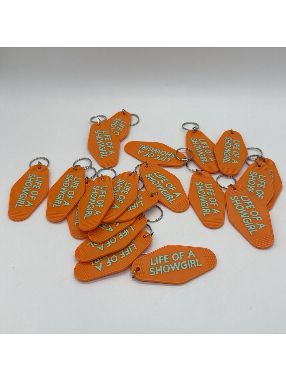 Lot of 20 Life Of A Showgirl Orange Motel Style Keychains Vintage Hotel Tag Key
